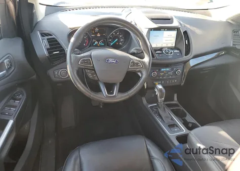 2018 Ford Escape Titanium z USA, uszkodzony, nr VIN 1FMCU9J94JUC84211
